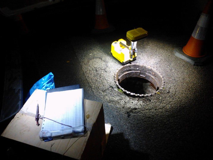 Adam sampling sewer water in Sheffield at 3am in search of lost urban streams